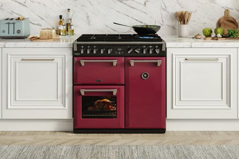 A red 90cm Belling Range Cooker installed in a kitchen