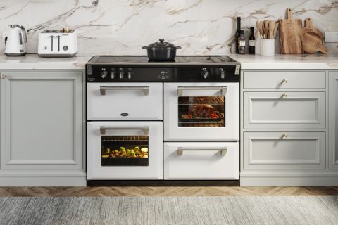 A White 110cm Range Cooker installed in a kitchen